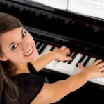 Beginner Piano Lessons Marbella, student performing on the piano. private tuition available in San Pedro and Estepona