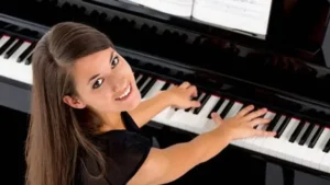 Adult piano student enjoying a lesson in Marbella – private tuition available in San Pedro and Estepona