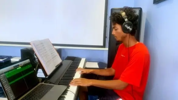 Marbella Piano Lessons student, practicing at in his home-studio.